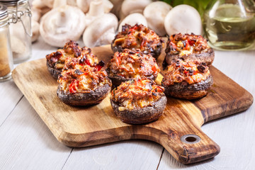 Baked champignon caps stuffed with minced meat