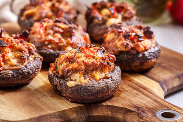 Baked champignon caps stuffed with minced meat