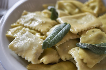 Ravioli pasta with butter and sage