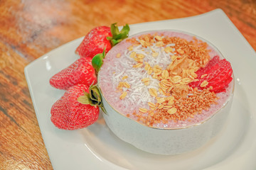 Detox superfoods breakfast bowl. Vegan coconut milk chia bean stawseeds pudding