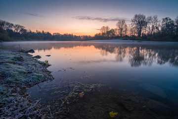 Frosty dawn at river