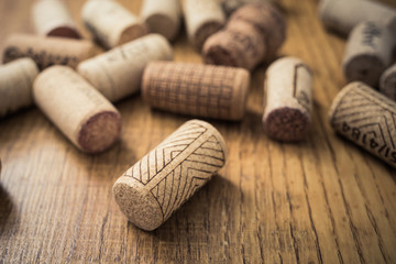 Bunch of wine corks on wooden table
