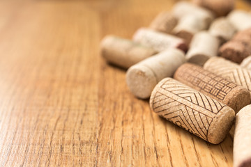 Bunch of wine corks on wooden table