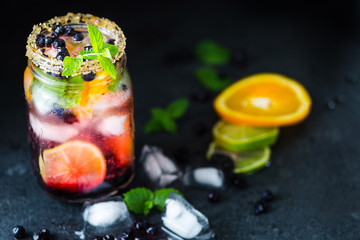 Blueberry Lemonade in Jar with Ice and Mint Leaves