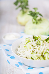 Salad with kohlrabi, cucumber and dill.