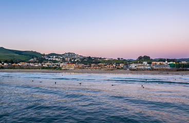 Waiting for the Sun to set at Pismo Beach, Oceano Dunes Natural Preserve, California, USA
