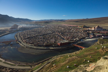 View of the Yarchen Gar Monastery with many shacks for monks in Garze Tibetan, Sichuan, China.