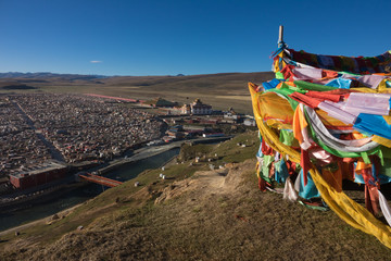 View of the Yarchen Gar Monastery with many shacks for monks in Garze Tibetan, Sichuan, China.