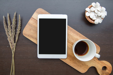 Desk table top overhead work space design layout at center tablet isolated on wood show product persent people