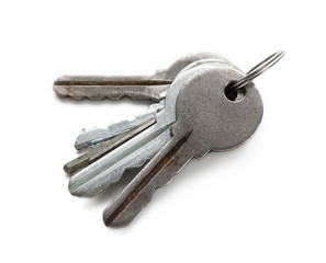 Set of rusty old keys on white isolated background