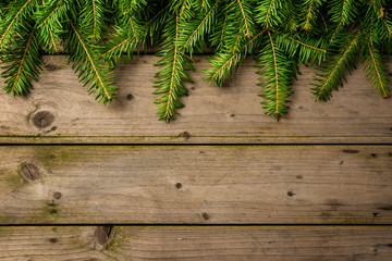 Christmas tree over an old wooden table. Christmas decoration