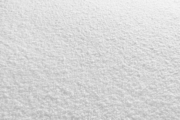 Fototapeta premium Winter background of snow glittering in shades of gray