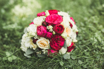 Beautiful wedding bouquet with different flowers, roses