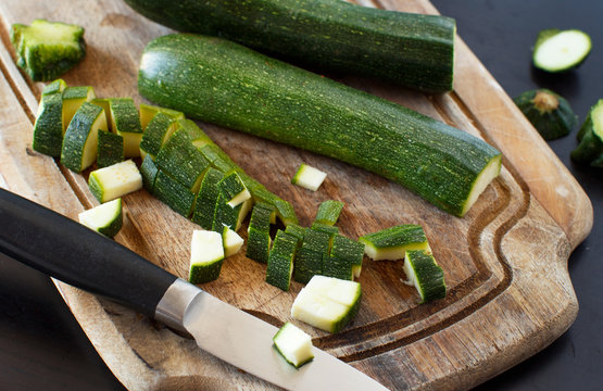 Fresh zucchini on wooden board
