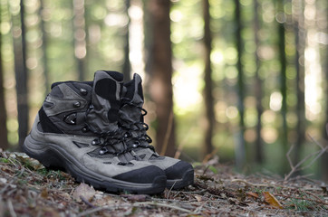 Hiker boots in the forest nobody
