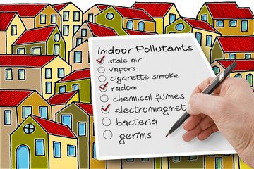 Hand write a check list of indoor air pollutants against a buildings background - concetp image...