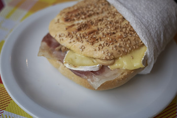 Sandwich with ham and brie