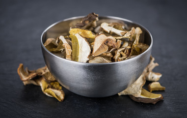 Dried Porcinis on a slate slab, selective focus