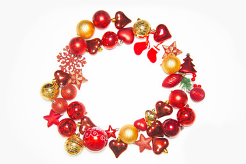 Top view on frame made of christmas decoration with new year balls on isolated white background