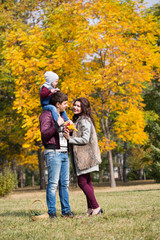 Fototapeta premium family walks, the autumn
