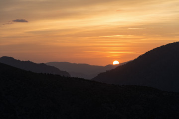 Fototapeta premium dramatic sunrise in the mountains of Corsica