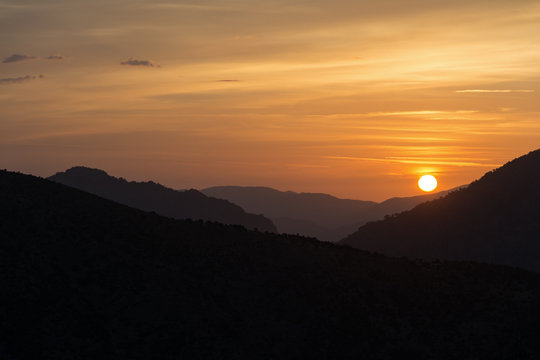 Fototapeta dramatic sunrise in the mountains of Corsica