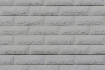 Fototapeta premium White decorative brick wall as a background, texture