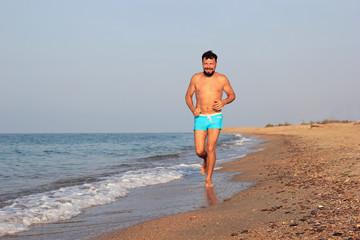 Man running on the beach