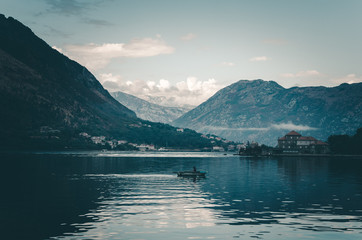 A fisherman on Kotor Bay at Dusk