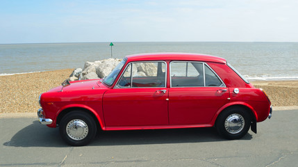 Obraz na płótnie Canvas Classic 1970's Red British Car