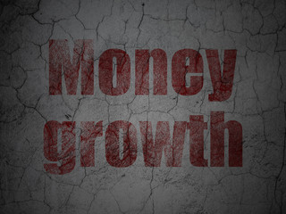 Currency concept: Red Money Growth on grunge textured concrete wall background