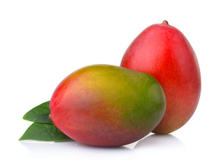 Ripe mango fruits with leaves isolated on white background