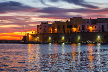 Sunset in Gallipoli, province of Lecce, Puglia, southern Italy. - obrazy, fototapety, plakaty
