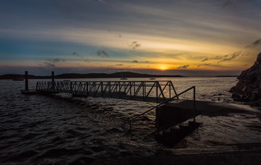 Fototapeta na wymiar Sunset over Clifden Bay