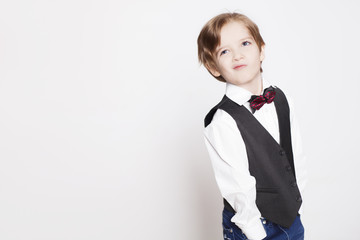 Portrait of laughing beautiful blond child. Close up of cheerful funny small boy isolated on white background.