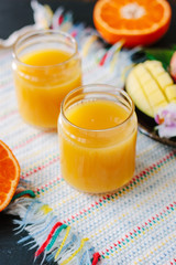 Mango and orange detox juice made from fresh fruits.
