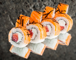 Roll with salmon, strawberry and creamcheese