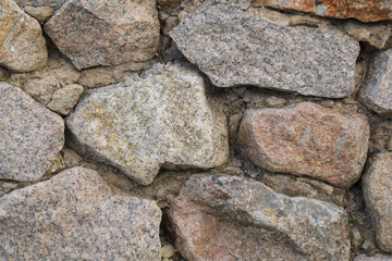 Texture. Masonry. Fragment of the ancient wall.Horizontal