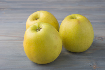 Fresh apple on gray background