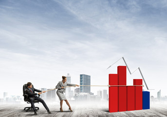Businesspeople pulling graph with rope as symbol of power and control
