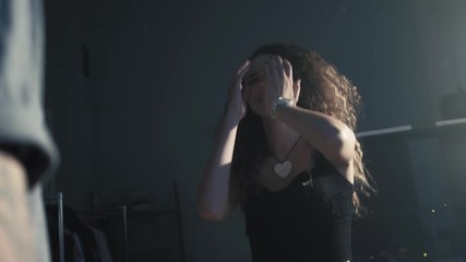 Couple having a quarrel. Woman is crying while man is scolding in the background, love and tears, student young love with emotions