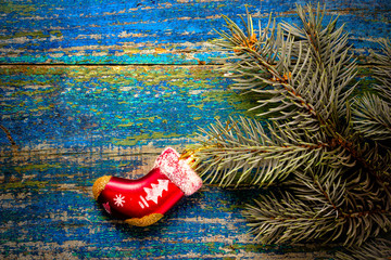 Christmas new year background. Red toy sock Santa Claus on the w