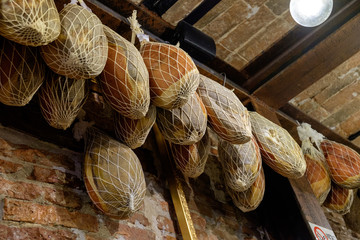 Traditional Italian ham left to dry