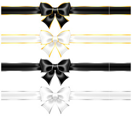White and black bows with gold and silver edging and ribbons