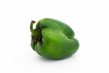Green bell pepper see from side isolated on white background