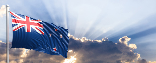 New Zealand flag on blue sky. 3d illustration