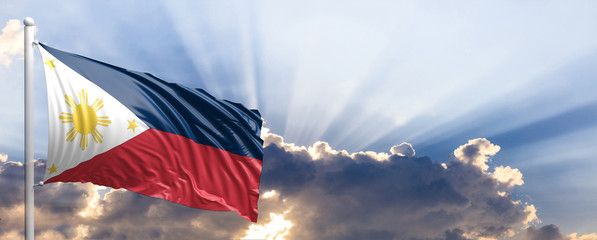 Philippines flag on blue sky. 3d illustration