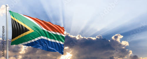 South Africa flag on blue sky. 3d illustration