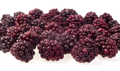 Blackberries ,frozen. Macro,frozen organic Blackberries,a handful of sweet,luscious frozen bramble isolated on white background,Abstract background from bramble,quick-frozen,healthy food.