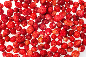 Strawberries, frozen. Macro,frozen organic strawberries,a handful of sweet, luscious frozen strawberries isolated on white background,frozen strawberries background,Abstract background from strawberry